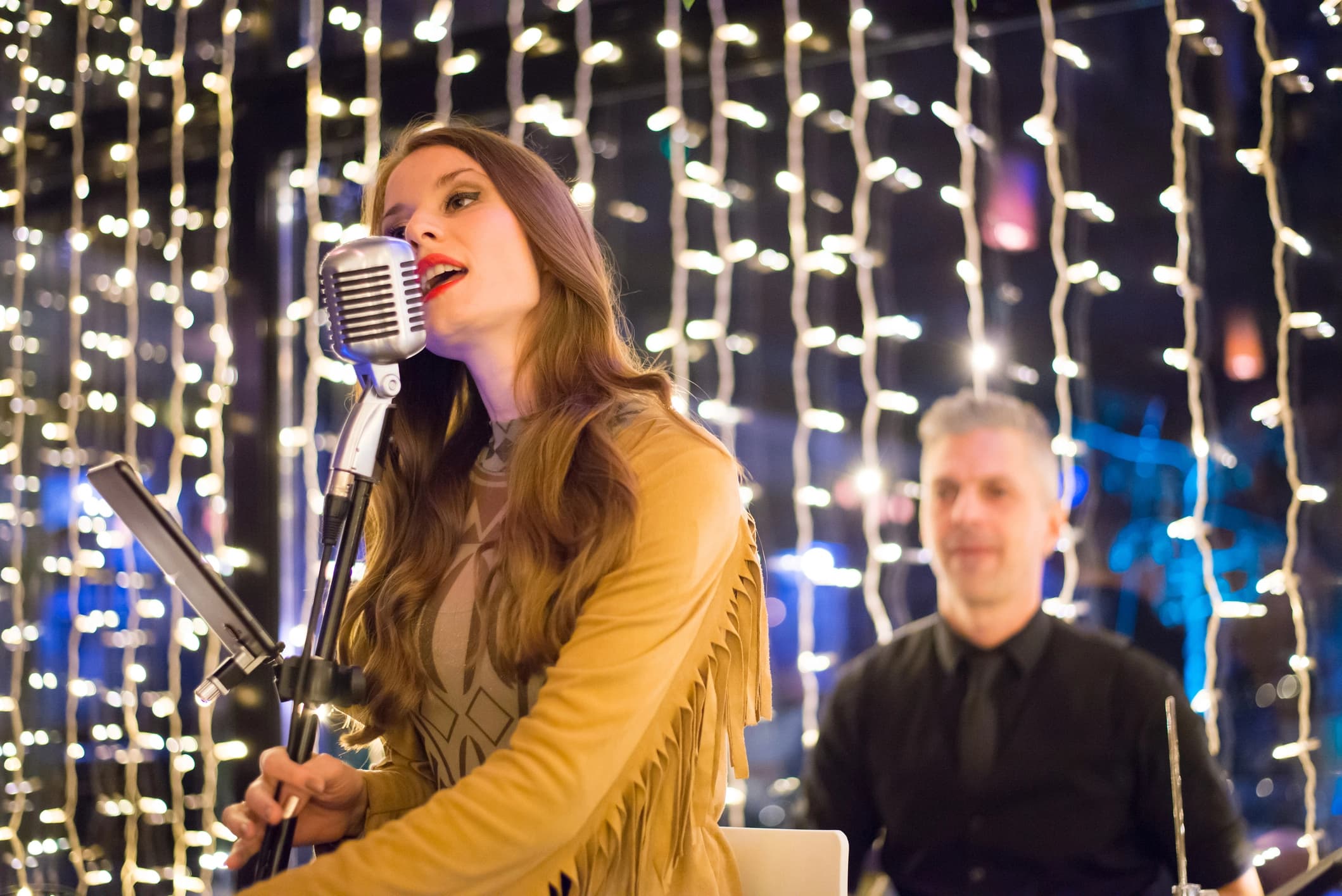 Vibrant event crowd at sunset