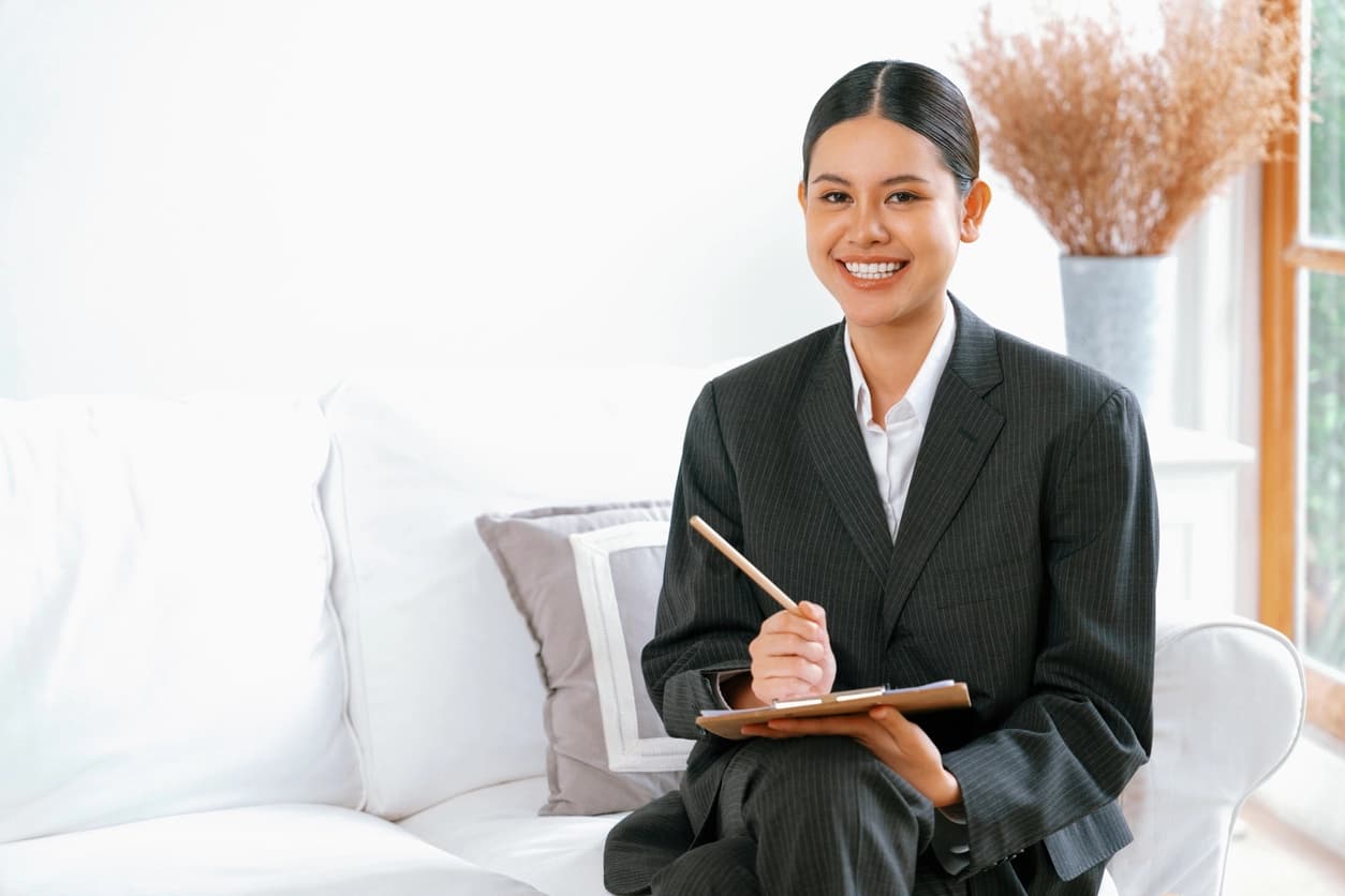 Professional event planner reviewing plans at a venue